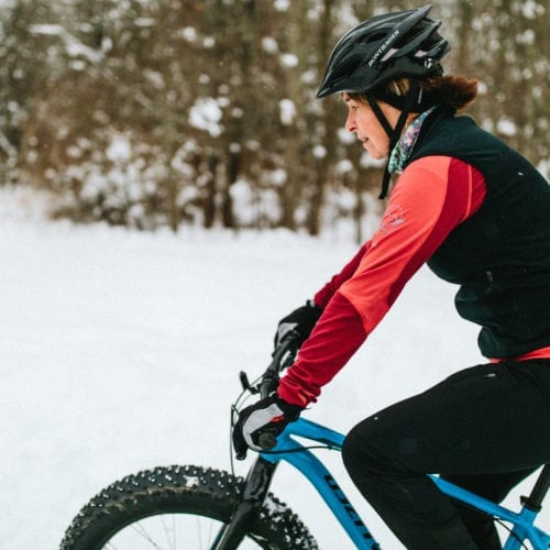 A woman riding a fat tire bike at Love Creek County Park in southwest Michigan.