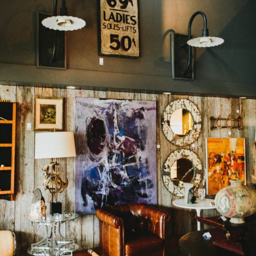 A diverse selection of wall art, furniture and lighting at Alchemy Art & Antiques in Harbert, Michigan.