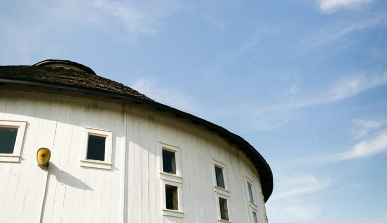 The top of the white round barn against a blue sky at Round Barn Winery in Baroda, Michigan.