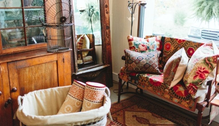 Colorful textiles and antique furnishings at Mazet Antiques in Three Oaks, Michigan.
