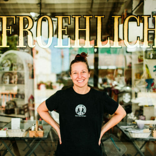 Owner Colleen Froehlich in front of her namesake bakery in Three Oaks, Michigan.