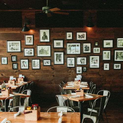 A view of the dining room and gallery wall at The Stray Dog bar and grill in New Buffalo, Michigan.