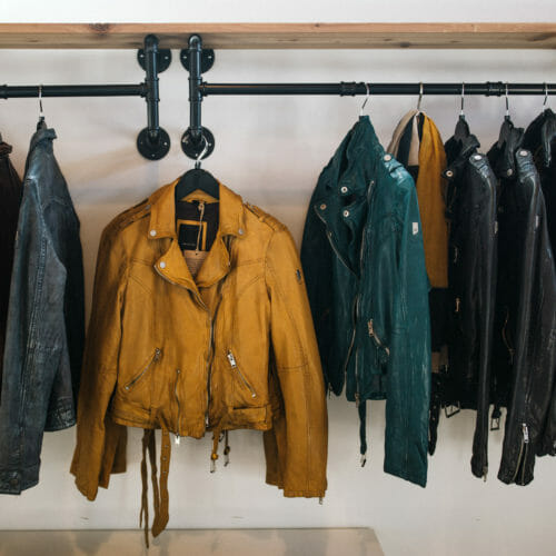 Display of small-label leather jackets at Goods and Heroes in Three Oaks, Michigan.