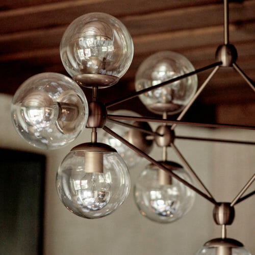 Contemporary chandelier with glass globes at Terrace Room in New Buffalo, Michigan.