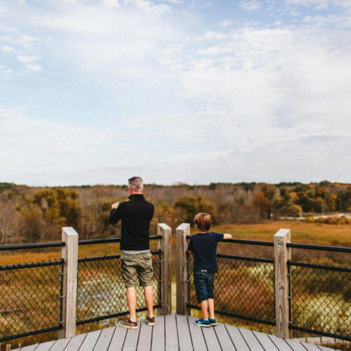 Father and son at the overlook at Galien River County Park in New Buffalo, Michigan.