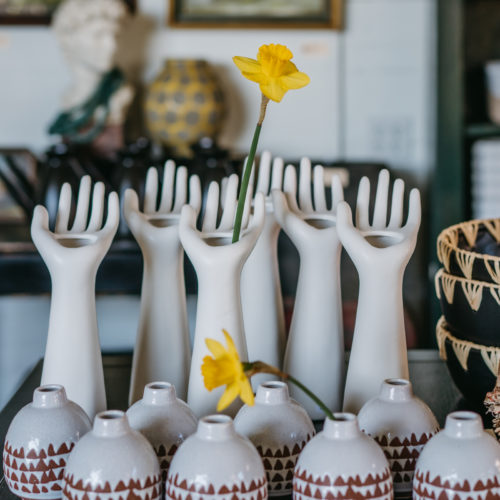 White ceramic hand vases at Alapash Mercantile in Three Oaks, Michigan.