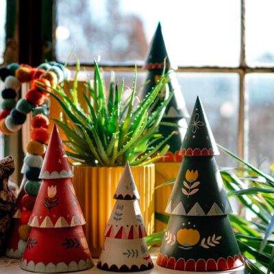 Hand-painted Christmas trees and a succulent plant at Alapash Mercantile in Three Oaks, Michigan.