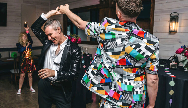 Two men hit the dance floor at Harbor Country Pride's Prom event in Union Pier, Michigan.