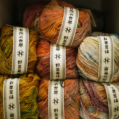 A stack of multi-colored yarn on the shelves in Yarn Haus, located in Three Oaks, Michigan