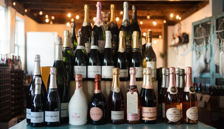 Bottles of champagne in three tiers inside P & E Bottle Shop in Three Oaks, Michigan