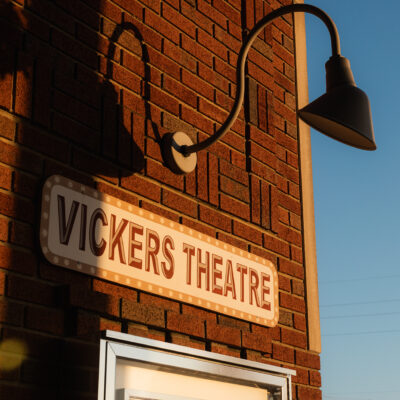Outdoor sign and lamp at Vickers Theatre in Three Oaks Michigan