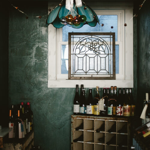 A cute corner with bottles of wine at P&E Bottle Shop in Three Oaks, Michigan