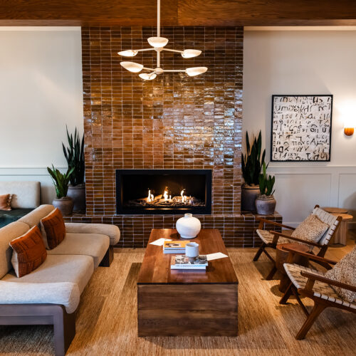 A fireplace roars at the Living Room in Marina Grand Resort in New Buffalo, Michigan