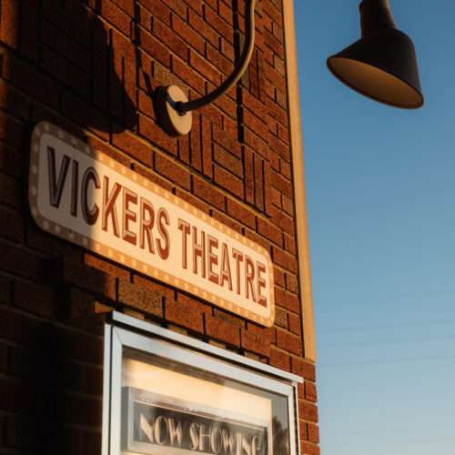 Now Showing sign at Vickers Theatre in Three Oaks Michigan