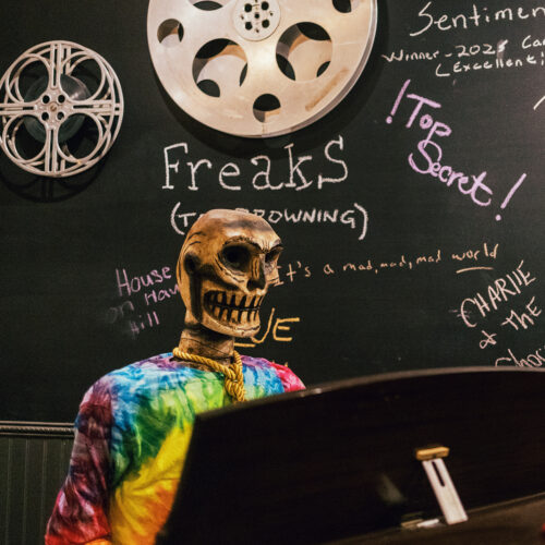 A community chalkboard with movie requests, plus an unexpected guest at Vickers Theatre in Three Oaks Michigan