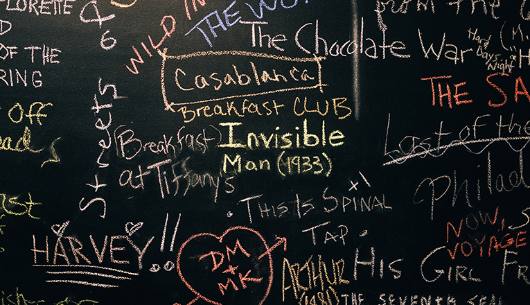 Chalkboard displaying community movie suggestions at Vickers Theatre in Three Oaks, Michigan