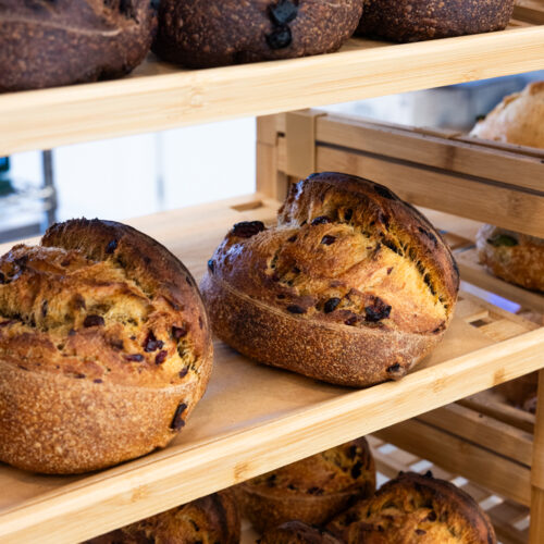 Freshly baked chocolate and cranberry sourdough stocked on shelves at Farmette in New Buffalo, Michigan
