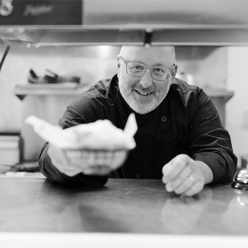 Order is up at Viola Cafe in Three Oaks, Michigan. Owner Scott King delivers.