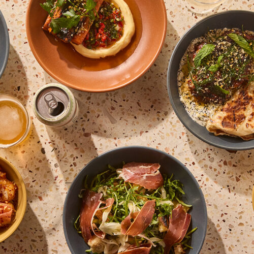 A top-down look at BBQ carrots, the sourdough salad, nam chim olives, biang biang shrimp and more – dishes available at PostBoy in New Buffalo, Michigan