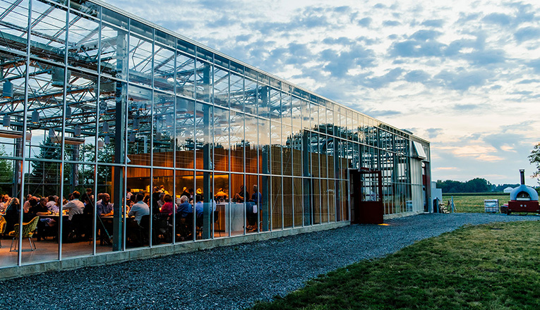 Dinner in the greenhouse at Granor Farm in Three Oaks, Michigan