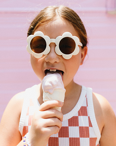 A girl licks an ice cream cone at Neon Moon in Union Pier, Michigan