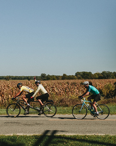 Bikers riding through Harbor Country during the Apple Cider Century Bike Tour
